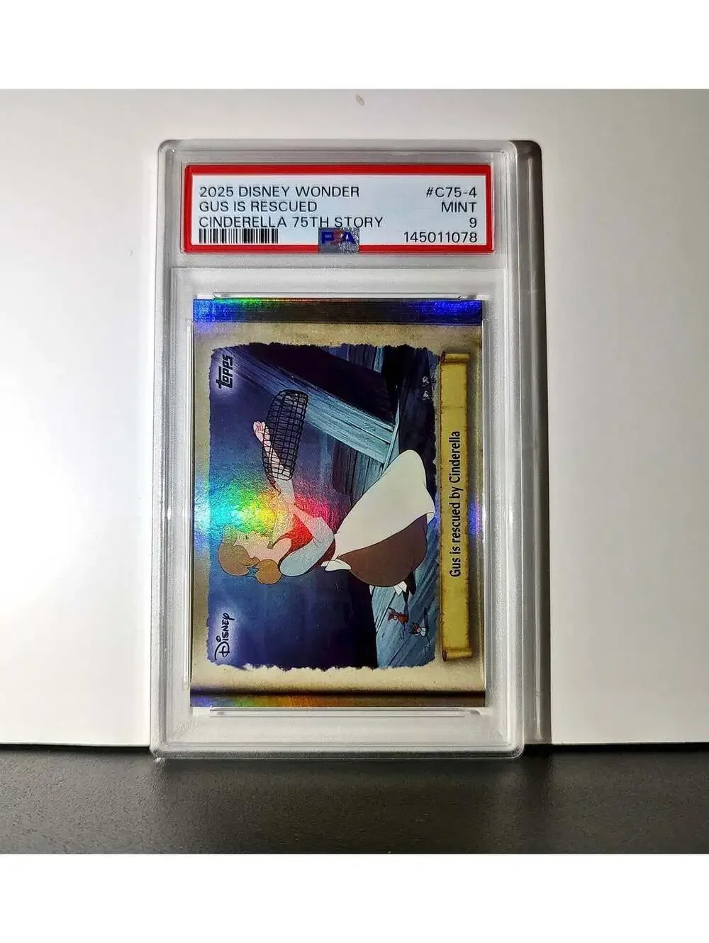 Gus is rescued by Cinderella 2025 Topps Disney #C75-4 Cinderella PSA 9